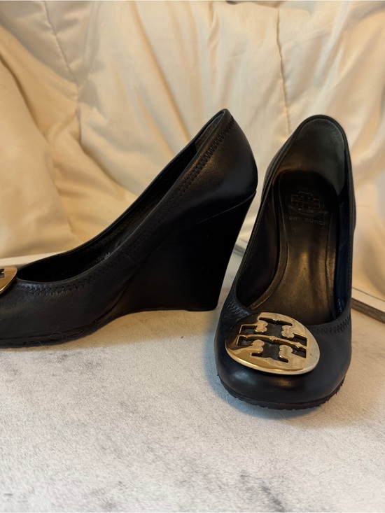 Tory Burch Shoes - Tory Burch Black Leather Wedge Pumps with Gold Logo Medallion